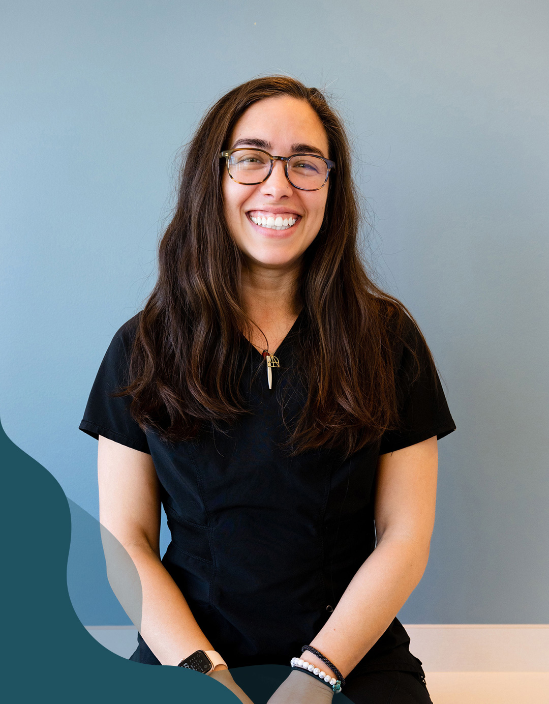 DR. ERICA LOZOYA with a black cat at meow bark